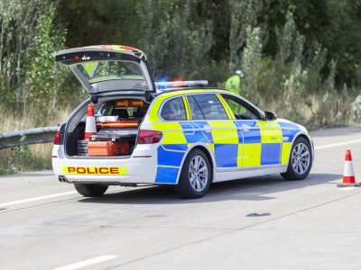 Police car at motorway accident or crime scene Police car at motorway accident or crime scene