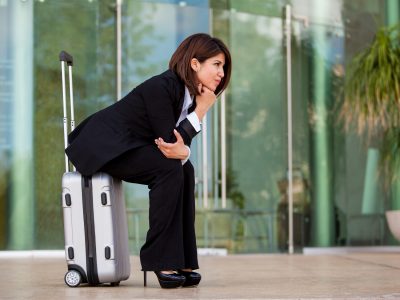Businesswoman waiting at an airport Businesswoman waiting at an airport
